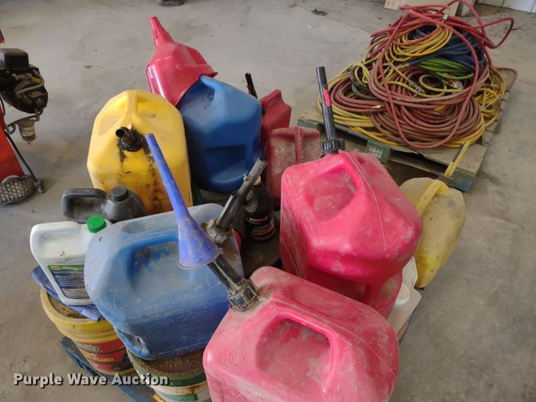 image for item JJ9976 Pallet of fuel cans and oil