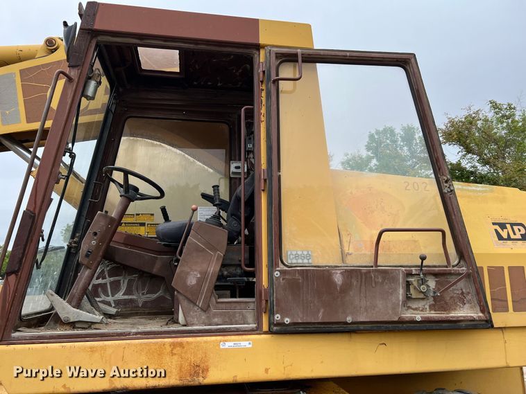 image for item IA9215 1992 Case 1085C  wheeled excavator