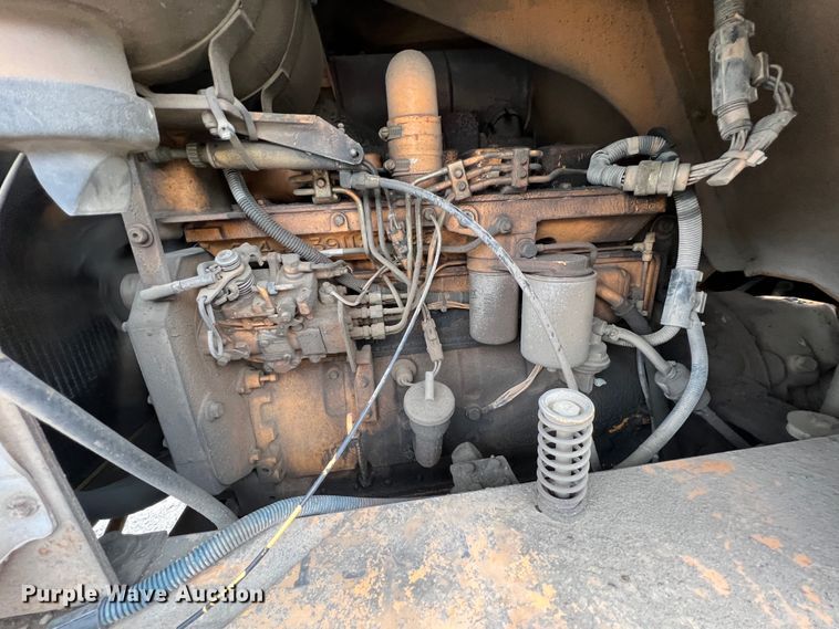 image for item IA9215 1992 Case 1085C  wheeled excavator