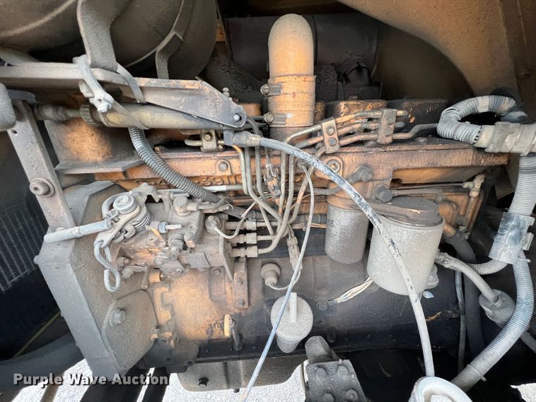 image for item IA9215 1992 Case 1085C  wheeled excavator