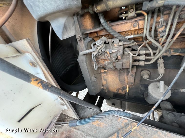 image for item IA9215 1992 Case 1085C  wheeled excavator