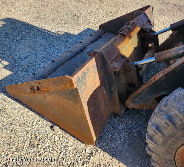 image for item MK9371 1998 New Holland LX665 Turbo  skid steer loader