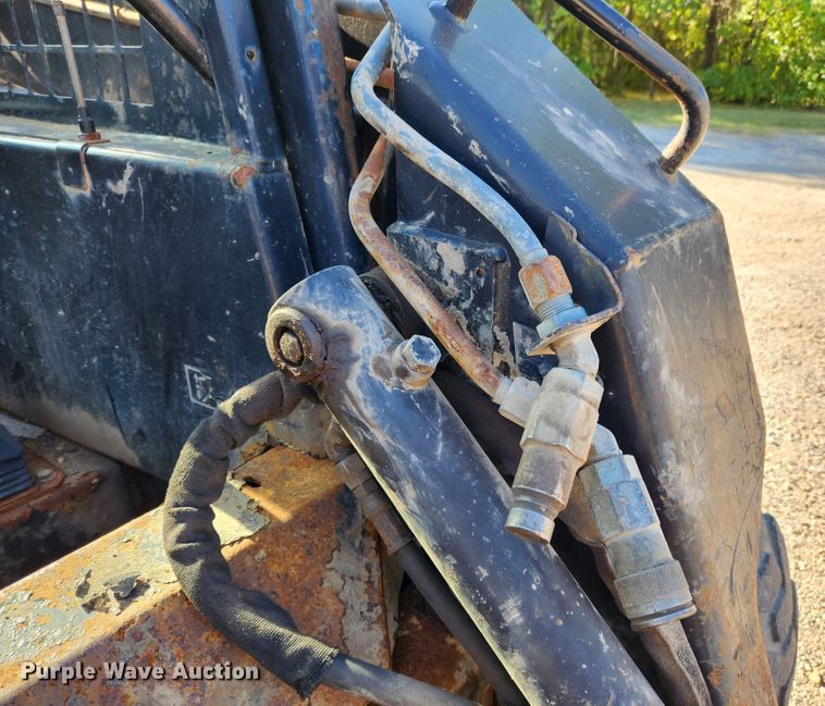 image for item MK9371 1998 New Holland LX665 Turbo  skid steer loader