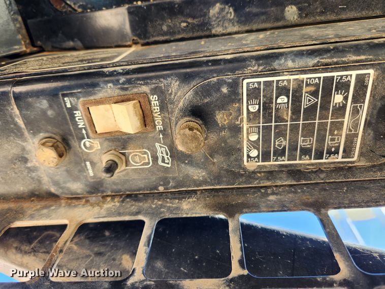 image for item MK9371 1998 New Holland LX665 Turbo  skid steer loader