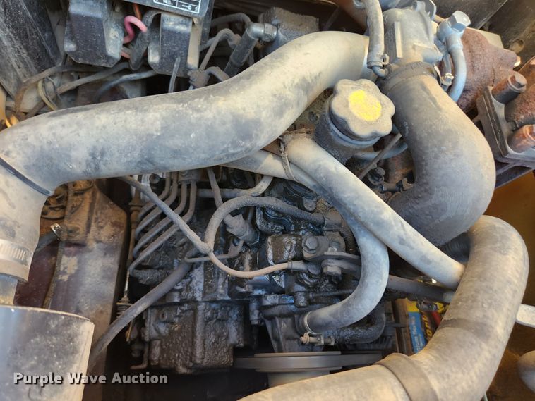 image for item MK9371 1998 New Holland LX665 Turbo  skid steer loader