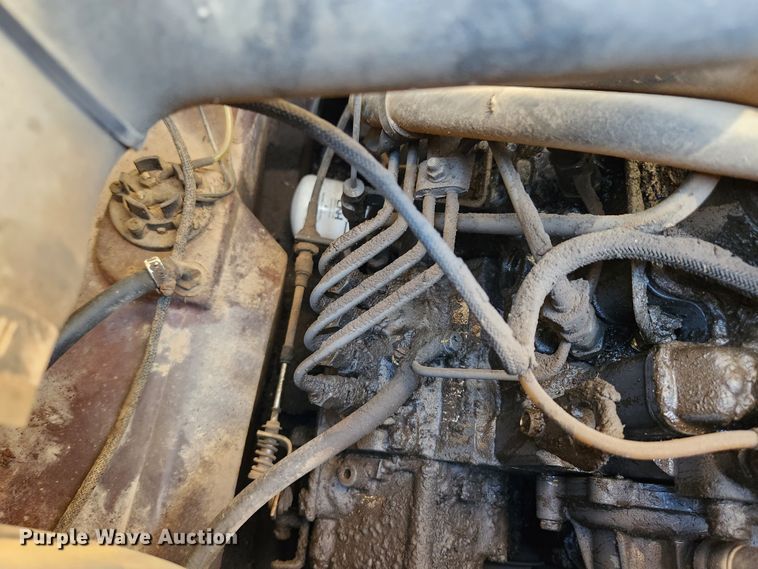 image for item MK9371 1998 New Holland LX665 Turbo  skid steer loader