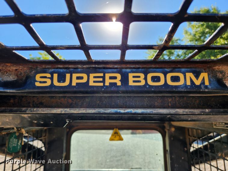 image for item MK9371 1998 New Holland LX665 Turbo  skid steer loader