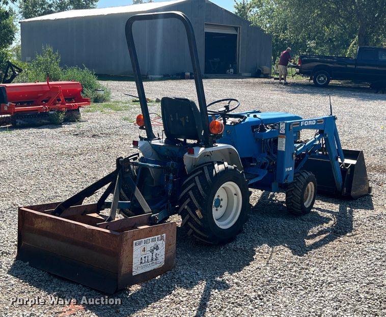 image for item IA9145 1997 New Holland 1220  MFWD tractor