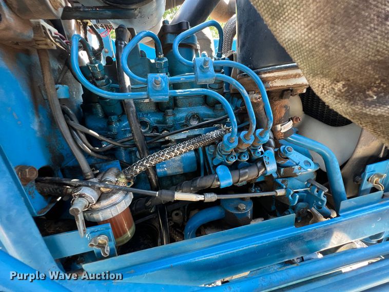 image for item IA9145 1997 New Holland 1220  MFWD tractor