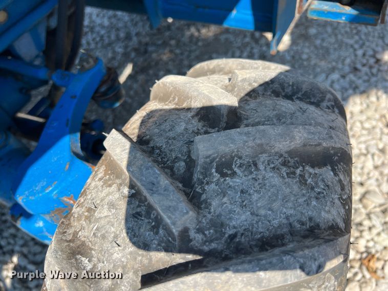 image for item IA9145 1997 New Holland 1220  MFWD tractor