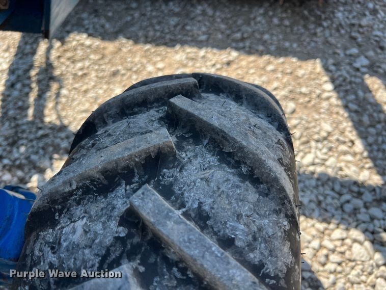 image for item IA9145 1997 New Holland 1220  MFWD tractor