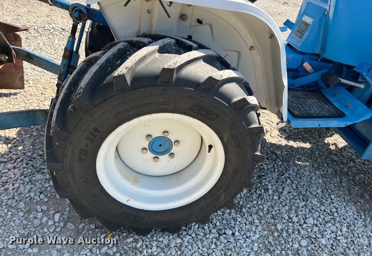 image for item IA9145 1997 New Holland 1220  MFWD tractor