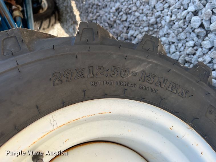 image for item IA9145 1997 New Holland 1220  MFWD tractor