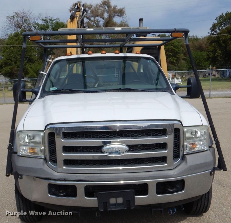 image for item LB9999 2005 Ford F550 Super Duty XLT  flatbed truck with boom mower
