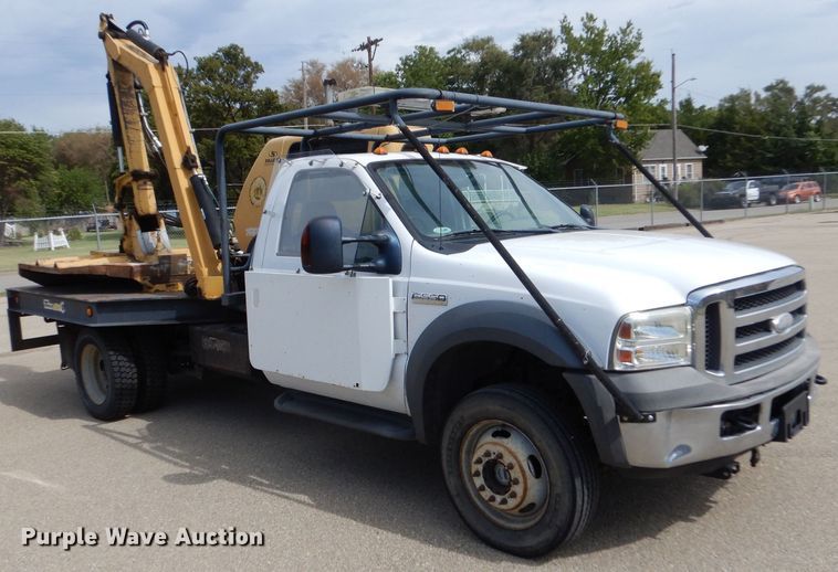 image for item LB9999 2005 Ford F550 Super Duty XLT  flatbed truck with boom mower