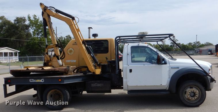 image for item LB9999 2005 Ford F550 Super Duty XLT  flatbed truck with boom mower