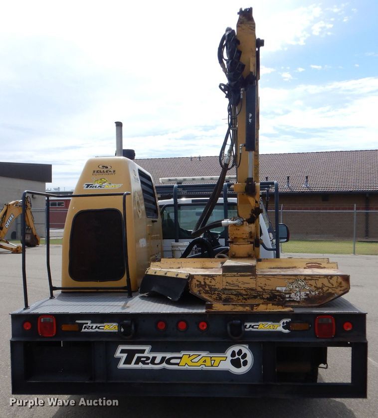 image for item LB9999 2005 Ford F550 Super Duty XLT  flatbed truck with boom mower