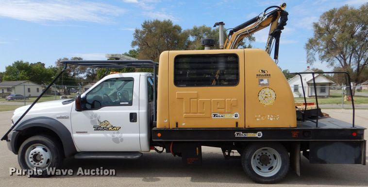 image for item LB9999 2005 Ford F550 Super Duty XLT  flatbed truck with boom mower