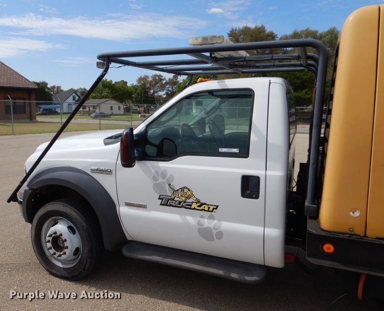 image for item LB9999 2005 Ford F550 Super Duty XLT  flatbed truck with boom mower