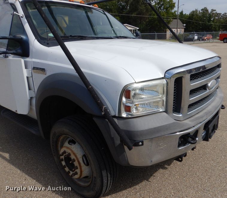 image for item LB9999 2005 Ford F550 Super Duty XLT  flatbed truck with boom mower