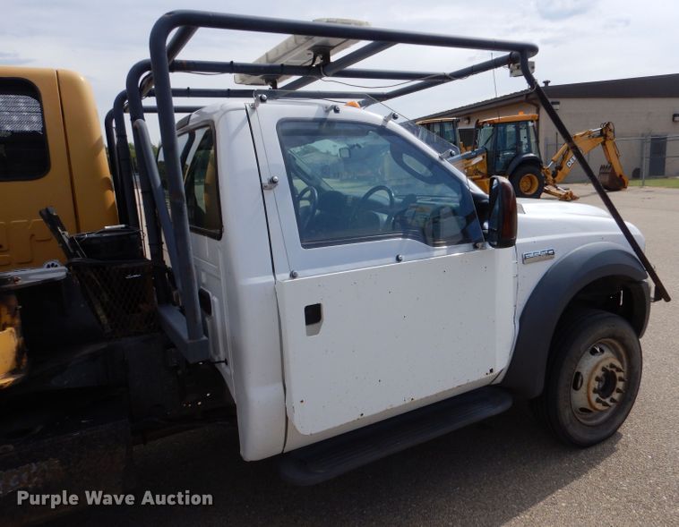 image for item LB9999 2005 Ford F550 Super Duty XLT  flatbed truck with boom mower