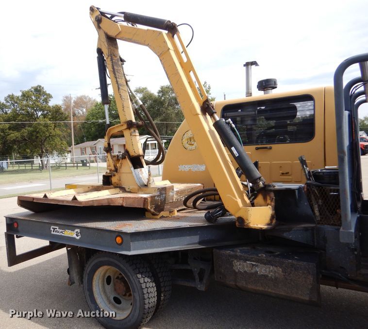 image for item LB9999 2005 Ford F550 Super Duty XLT  flatbed truck with boom mower