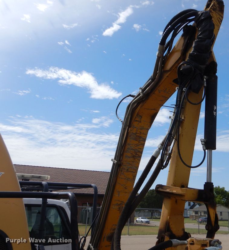 image for item LB9999 2005 Ford F550 Super Duty XLT  flatbed truck with boom mower