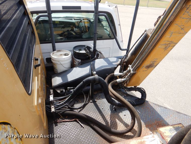 image for item LB9999 2005 Ford F550 Super Duty XLT  flatbed truck with boom mower