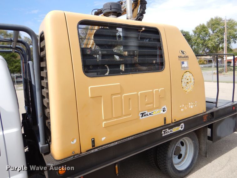 image for item LB9999 2005 Ford F550 Super Duty XLT  flatbed truck with boom mower