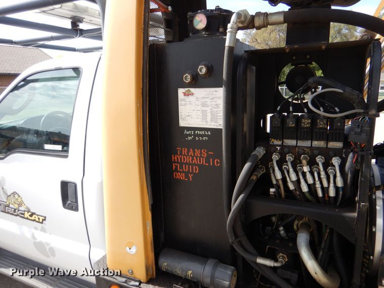 image for item LB9999 2005 Ford F550 Super Duty XLT  flatbed truck with boom mower