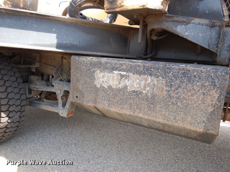 image for item LB9999 2005 Ford F550 Super Duty XLT  flatbed truck with boom mower