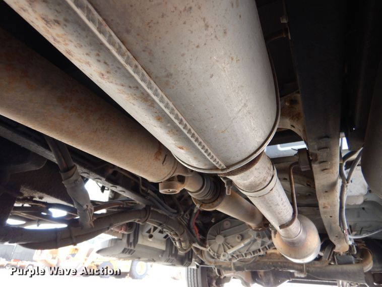 image for item LB9999 2005 Ford F550 Super Duty XLT  flatbed truck with boom mower