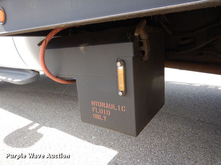 image for item LB9999 2005 Ford F550 Super Duty XLT  flatbed truck with boom mower