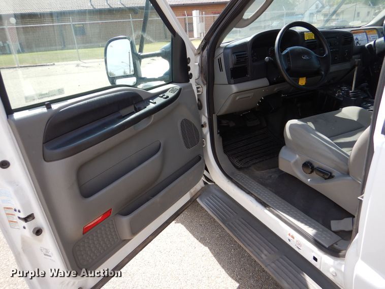 image for item LB9999 2005 Ford F550 Super Duty XLT  flatbed truck with boom mower