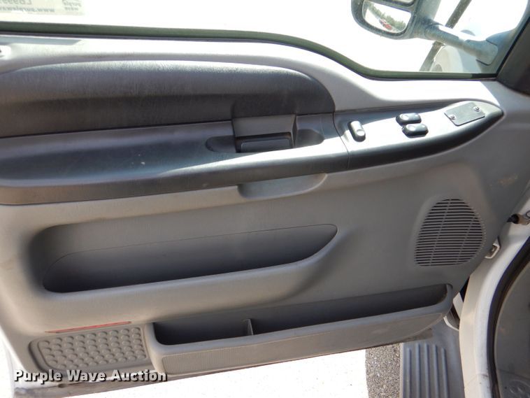 image for item LB9999 2005 Ford F550 Super Duty XLT  flatbed truck with boom mower