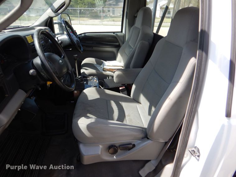 image for item LB9999 2005 Ford F550 Super Duty XLT  flatbed truck with boom mower