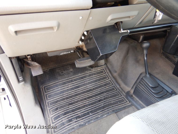 image for item LB9999 2005 Ford F550 Super Duty XLT  flatbed truck with boom mower