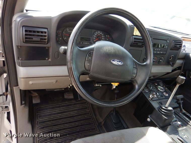 image for item LB9999 2005 Ford F550 Super Duty XLT  flatbed truck with boom mower