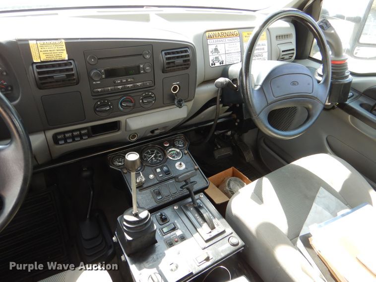 image for item LB9999 2005 Ford F550 Super Duty XLT  flatbed truck with boom mower