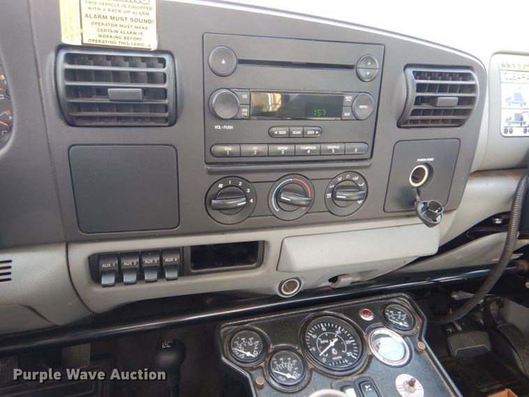 image for item LB9999 2005 Ford F550 Super Duty XLT  flatbed truck with boom mower