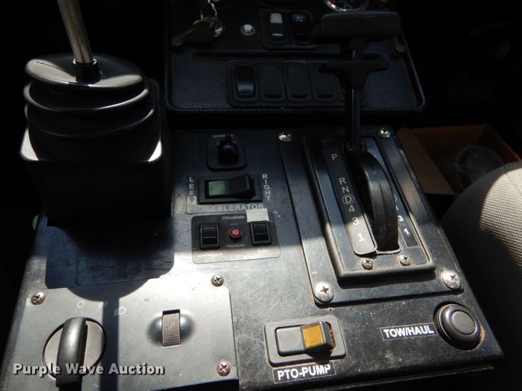 image for item LB9999 2005 Ford F550 Super Duty XLT  flatbed truck with boom mower