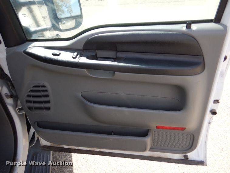 image for item LB9999 2005 Ford F550 Super Duty XLT  flatbed truck with boom mower