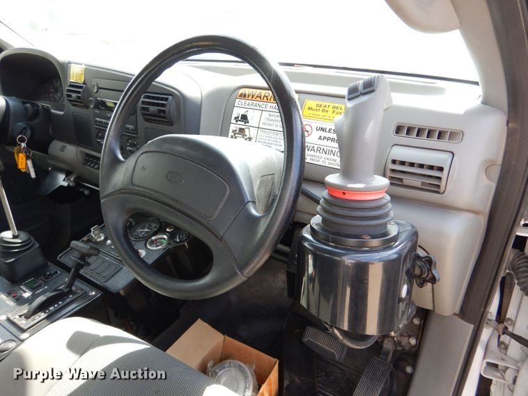 image for item LB9999 2005 Ford F550 Super Duty XLT  flatbed truck with boom mower