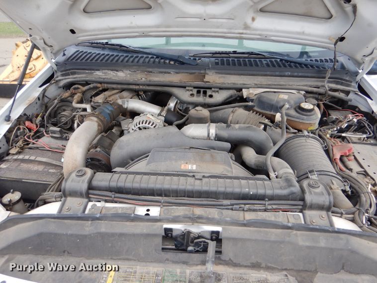 image for item LB9999 2005 Ford F550 Super Duty XLT  flatbed truck with boom mower