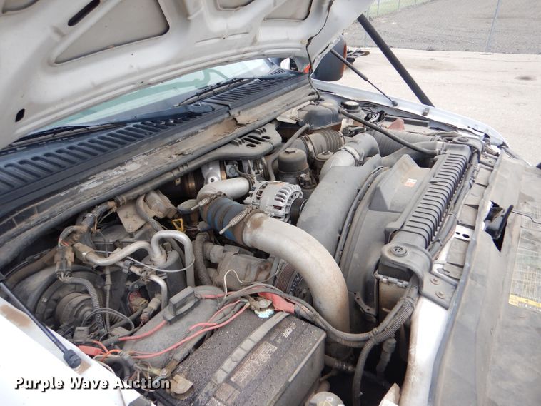 image for item LB9999 2005 Ford F550 Super Duty XLT  flatbed truck with boom mower