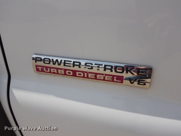 image for item LB9999 2005 Ford F550 Super Duty XLT  flatbed truck with boom mower