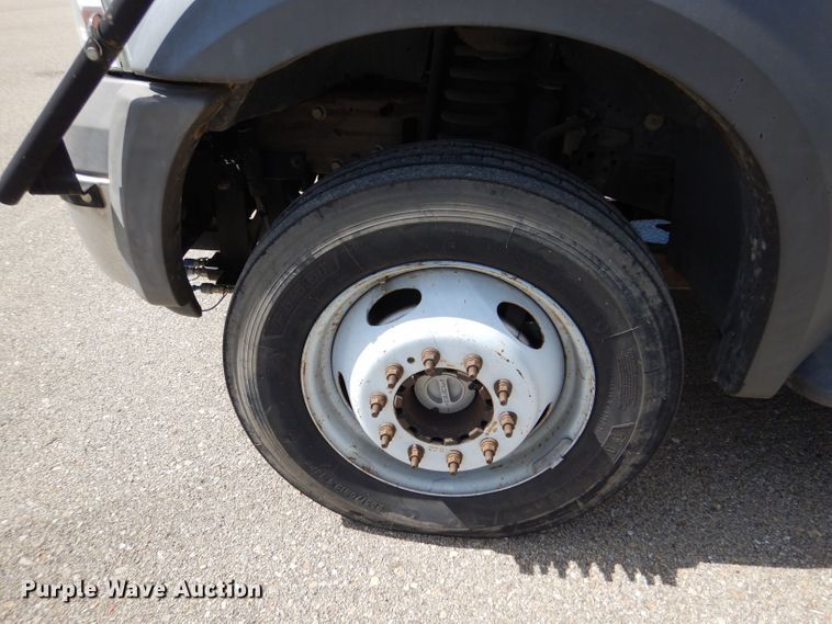 image for item LB9999 2005 Ford F550 Super Duty XLT  flatbed truck with boom mower