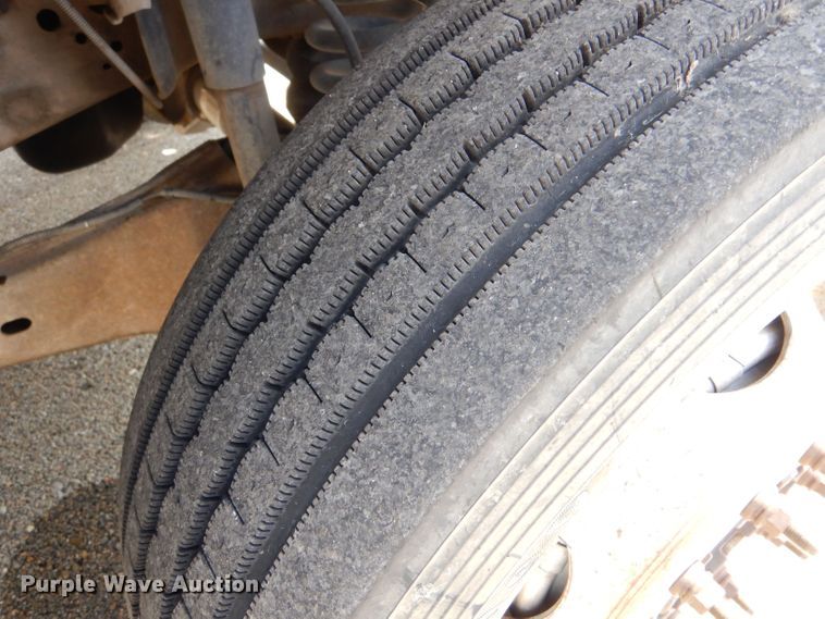 image for item LB9999 2005 Ford F550 Super Duty XLT  flatbed truck with boom mower