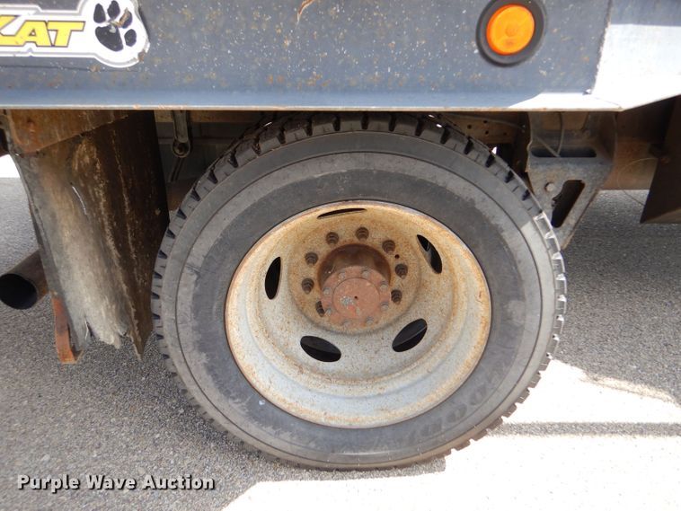 image for item LB9999 2005 Ford F550 Super Duty XLT  flatbed truck with boom mower