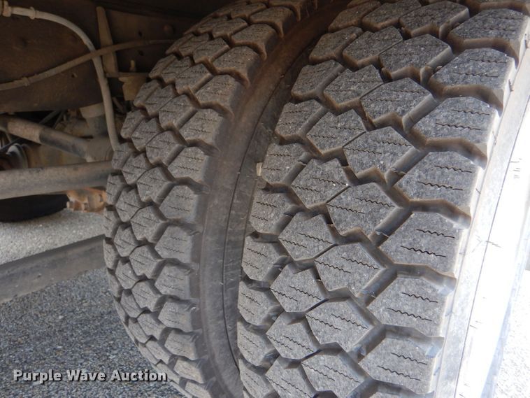 image for item LB9999 2005 Ford F550 Super Duty XLT  flatbed truck with boom mower